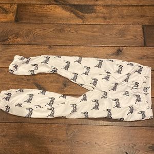 Revenge Track pants small revenge all over track pants